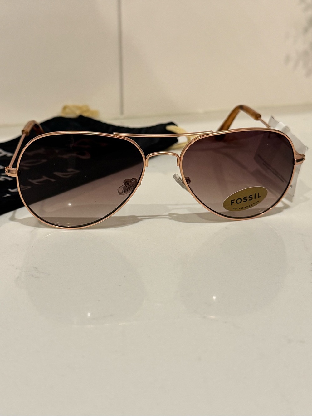 Fossil aviator sunglasses.